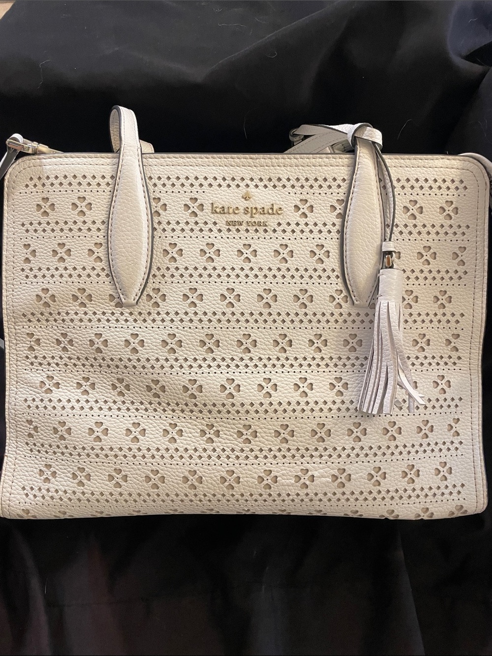kate spade Cream Perforated Leather Tote with Tassel Accent